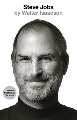 Book cover of Steve Jobs by Walter Isaacson with a portrait of Steve Jobs wearing round glasses and a light smile.